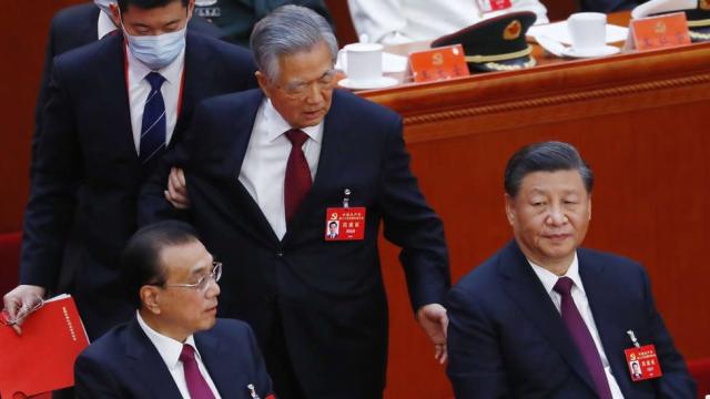 Hu Jintao: ex-president escorted out of China party congress